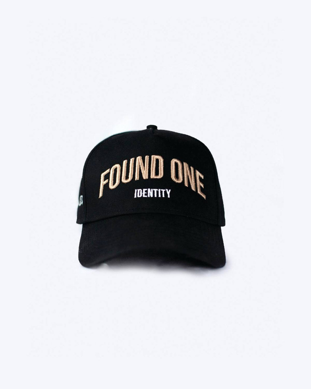 Front view of the Found One Identity Cap in black. A-frame snapback design with bold embroidered branding on the front.