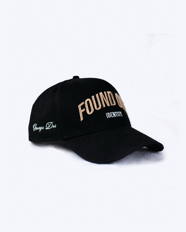 Black A-Frame Snapback Found One Identity Cap with embroidery. Features 'Found One Identity' text on the front and 'Imago Dei' on the side.